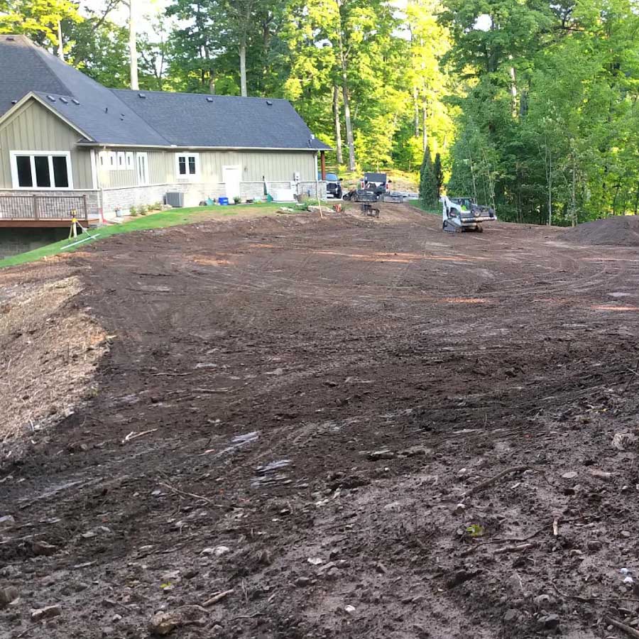 Residential excavation services changed a hilly, rocky yard into a usable sports field for the children.